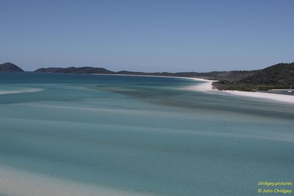 Whitehaven Beach: During a break in the COVID19 lockdowns and restricted to travel within our own state only, we trekked to the amazing Whitehaven Beach in the Whitsunday Islands in June, 2020. This photo is taken from above Hill Inlet looking over the amazing Whitehaven Beach. The turquoise water and pure white sand is breathtaking and unforgettable and perhaps the most iconic shot of the area.